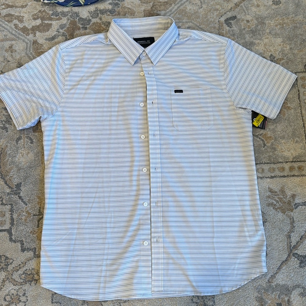 O’Neill Trvlrseries striped polo- size large with tags!
